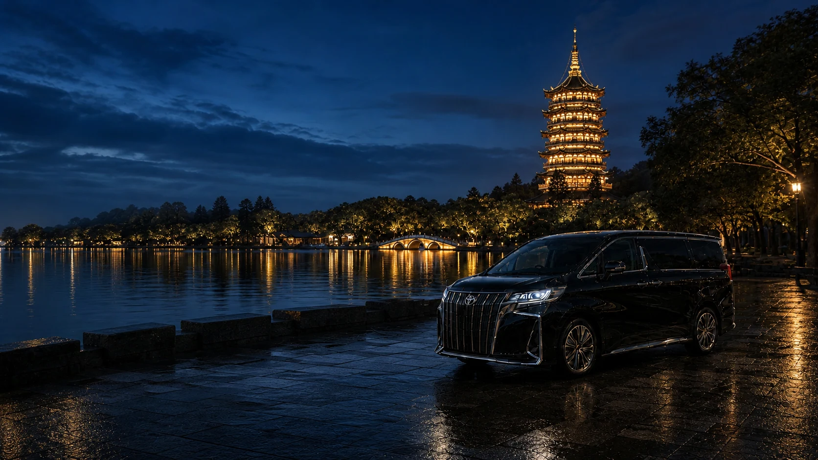 Executive MPV beside Huizhou West Lake with illuminated pagodas at blue hour